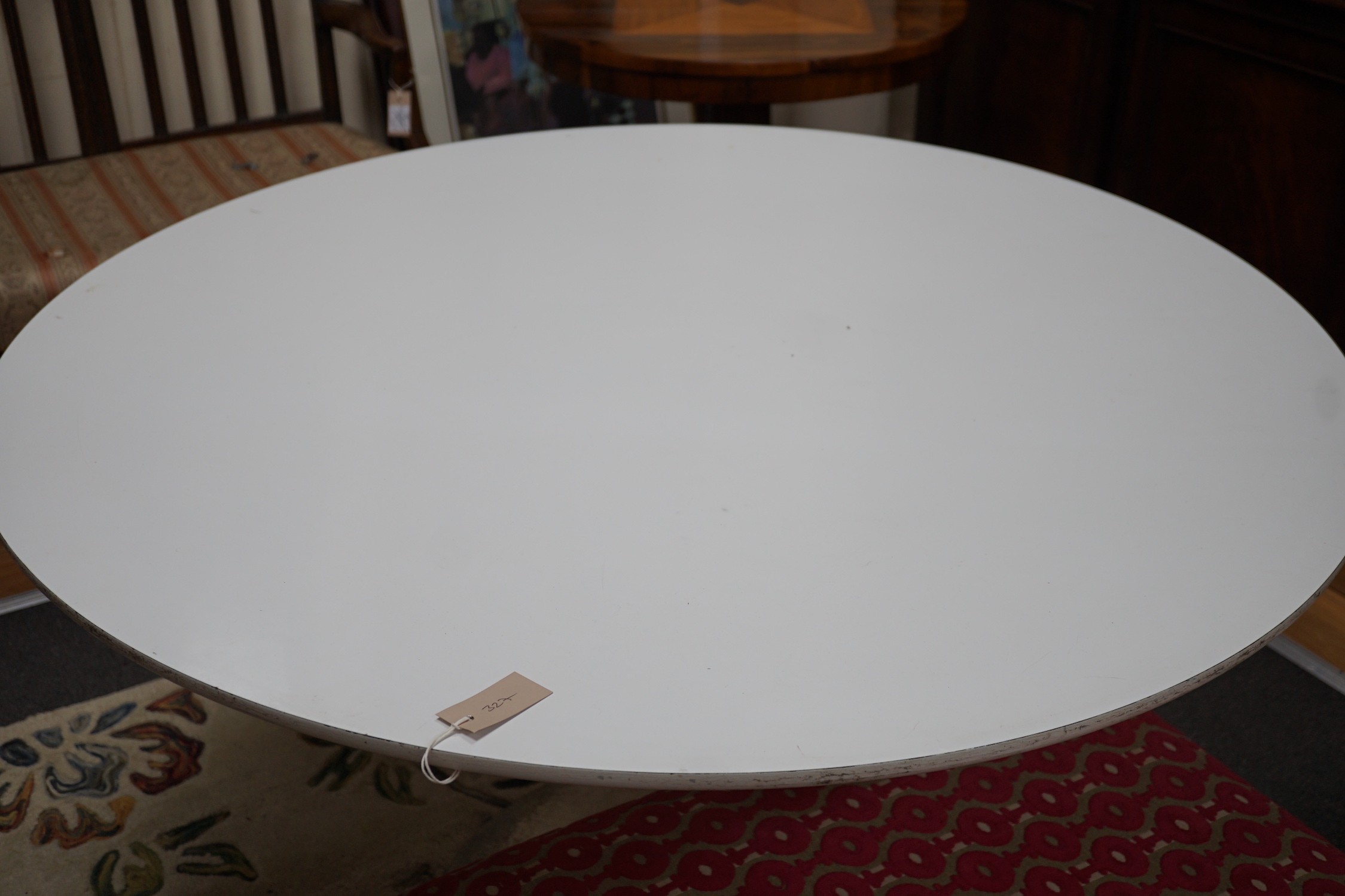 A mid century melamine topped ‘Tulip’ design dining table, diameter 121cm *Please note the sale commences at 9am.